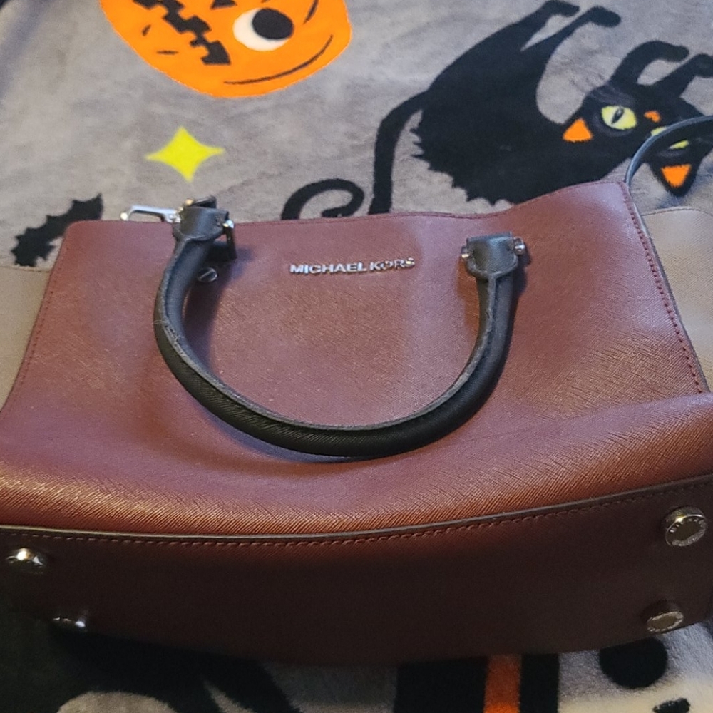 Maroon and tan Michael Kors bag